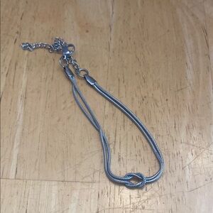 Elegant Silver tone Knot Bracelet adjusts 6.5 to 9 in